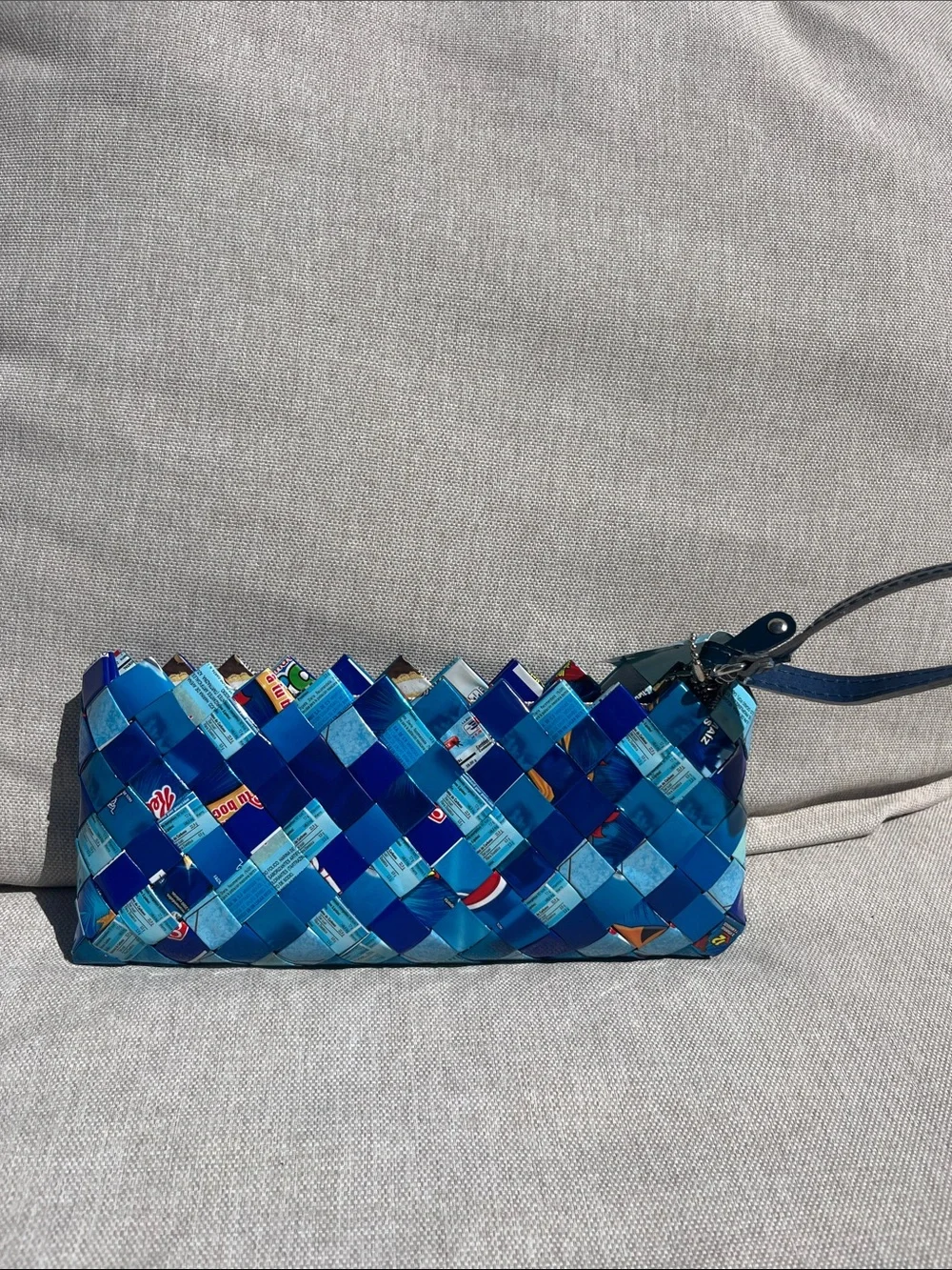 handmade blue woven wristlet clutch